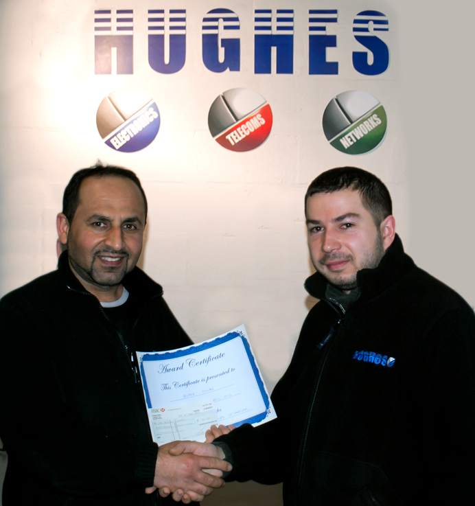 Receiving-prize-for-Hughes-Electronics-innovation